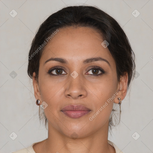 Joyful latino young-adult female with medium  brown hair and brown eyes