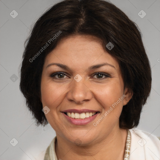 Joyful white adult female with medium  brown hair and brown eyes