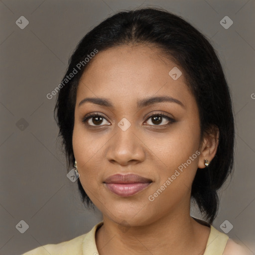 Joyful black young-adult female with medium  black hair and brown eyes