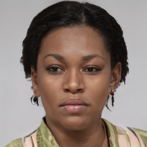Neutral black young-adult female with short  brown hair and brown eyes