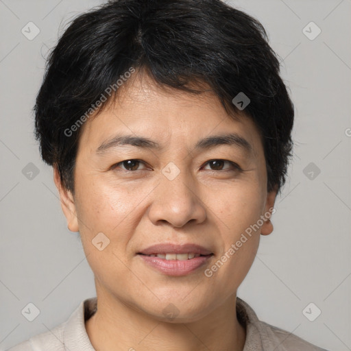 Joyful white adult female with short  brown hair and brown eyes