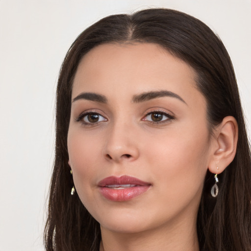 Neutral white young-adult female with long  brown hair and brown eyes