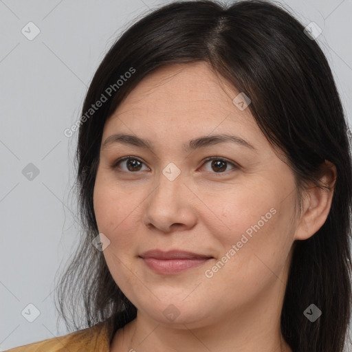 Joyful white adult female with medium  brown hair and brown eyes