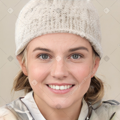 Joyful white young-adult female with medium  brown hair and blue eyes