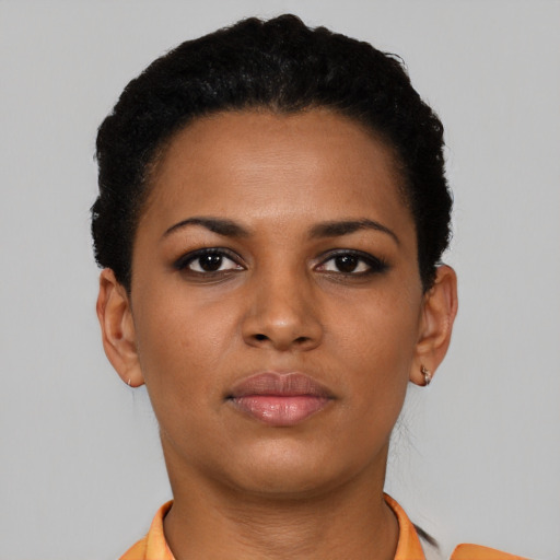 Neutral black young-adult female with short  black hair and brown eyes