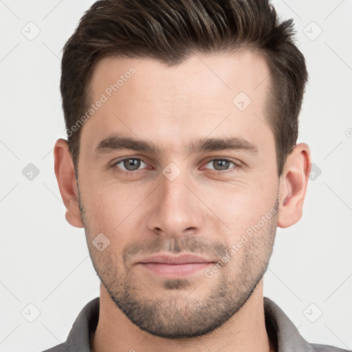 Neutral white young-adult male with short  brown hair and grey eyes