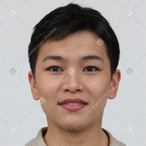 Joyful asian young-adult male with short  brown hair and brown eyes