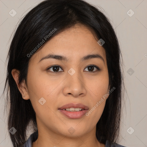 Joyful asian young-adult female with long  brown hair and brown eyes