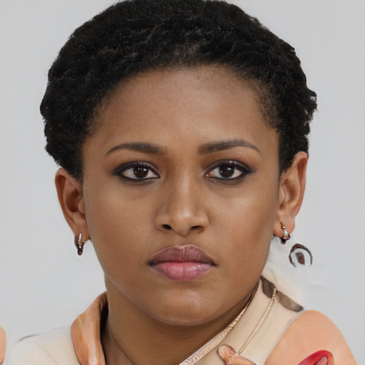 Neutral black young-adult female with short  brown hair and brown eyes