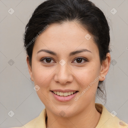 Joyful latino young-adult female with medium  brown hair and brown eyes