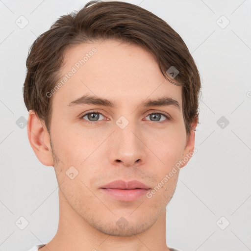 Neutral white young-adult male with short  brown hair and grey eyes