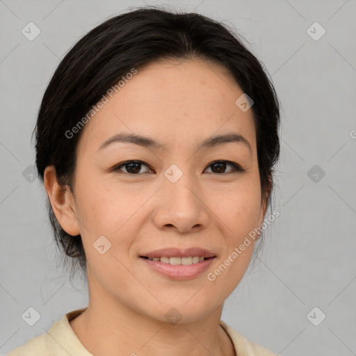 Joyful asian young-adult female with medium  brown hair and brown eyes