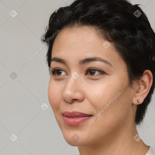 Joyful white young-adult female with short  black hair and brown eyes