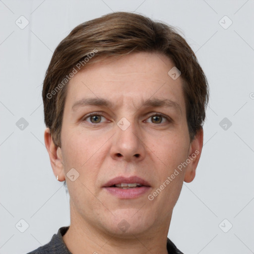 Neutral white adult male with short  brown hair and grey eyes