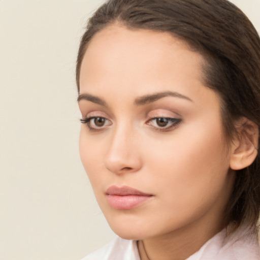 Neutral white young-adult female with medium  brown hair and brown eyes