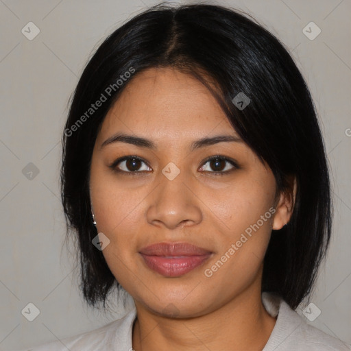 Joyful latino young-adult female with medium  black hair and brown eyes