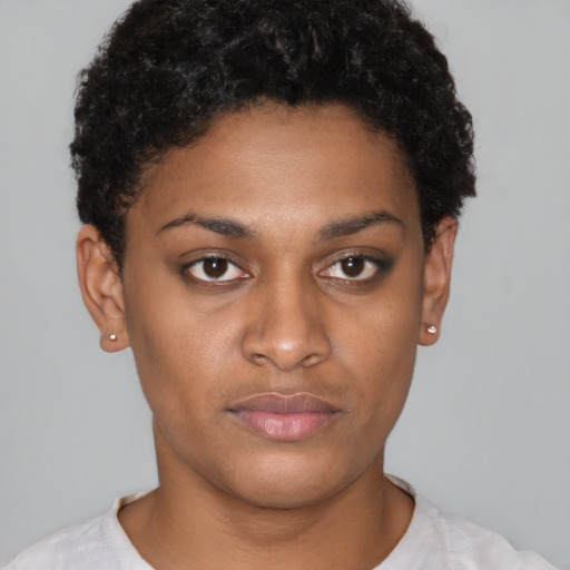 Neutral latino young-adult female with short  brown hair and brown eyes