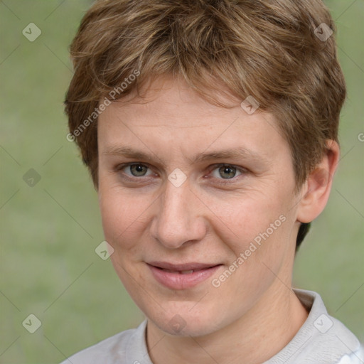 Joyful white adult female with short  brown hair and brown eyes