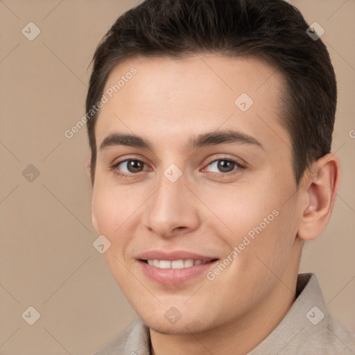 Joyful white young-adult male with short  brown hair and brown eyes