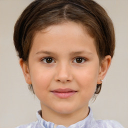 Joyful white child female with short  brown hair and brown eyes