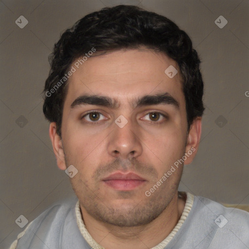 Neutral white young-adult male with short  black hair and brown eyes