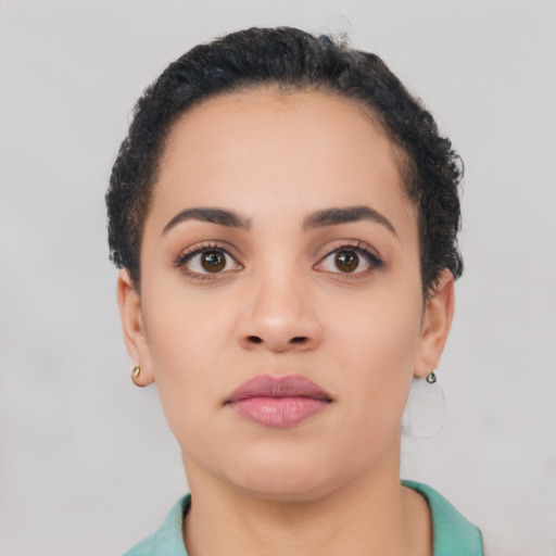 Neutral latino young-adult female with short  black hair and brown eyes