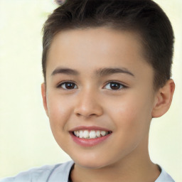 Joyful white child male with short  brown hair and brown eyes