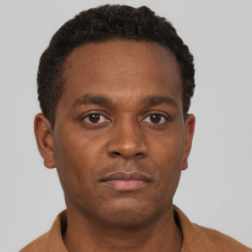 Neutral black young-adult male with short  brown hair and brown eyes