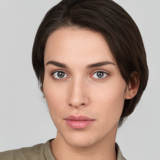 Neutral white young-adult female with medium  brown hair and brown eyes