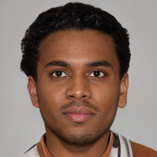 Neutral latino young-adult male with short  brown hair and brown eyes