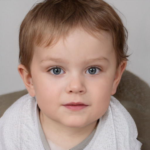 Neutral white child male with short  brown hair and blue eyes