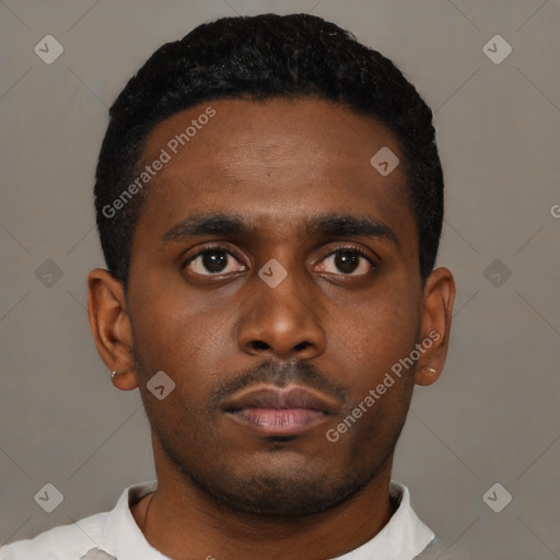 Neutral black young-adult male with short  black hair and brown eyes
