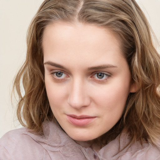 Neutral white young-adult female with medium  brown hair and grey eyes