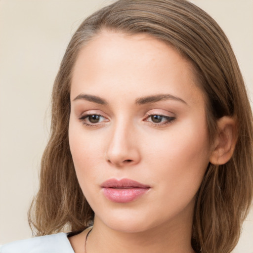 Neutral white young-adult female with medium  brown hair and brown eyes