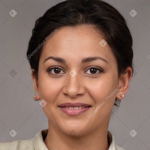 Joyful white adult female with short  brown hair and brown eyes