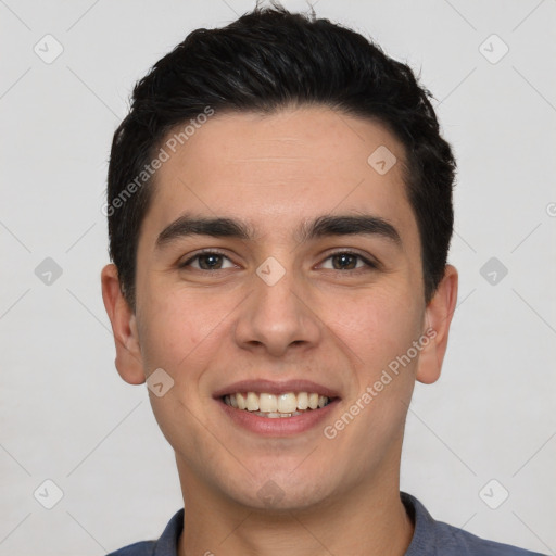 Joyful white young-adult male with short  black hair and brown eyes