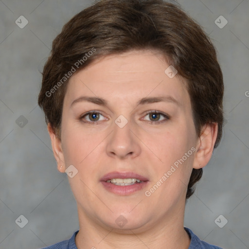 Joyful white adult female with short  brown hair and brown eyes