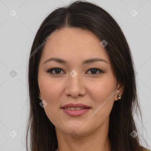 Joyful latino young-adult female with long  brown hair and brown eyes