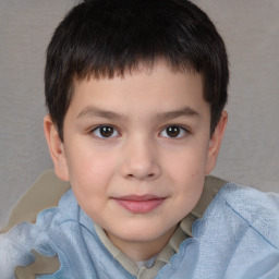 Joyful white child male with short  brown hair and brown eyes