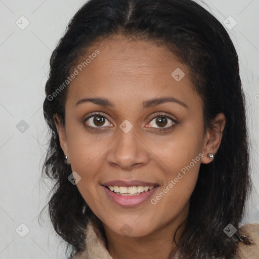 Joyful white young-adult female with long  brown hair and brown eyes