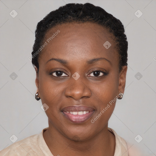 Joyful black young-adult female with short  black hair and brown eyes