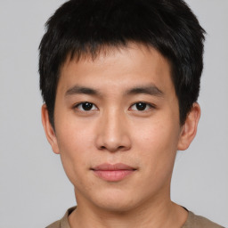 Neutral asian young-adult male with short  brown hair and brown eyes