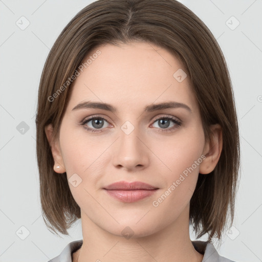 Neutral white young-adult female with medium  brown hair and grey eyes