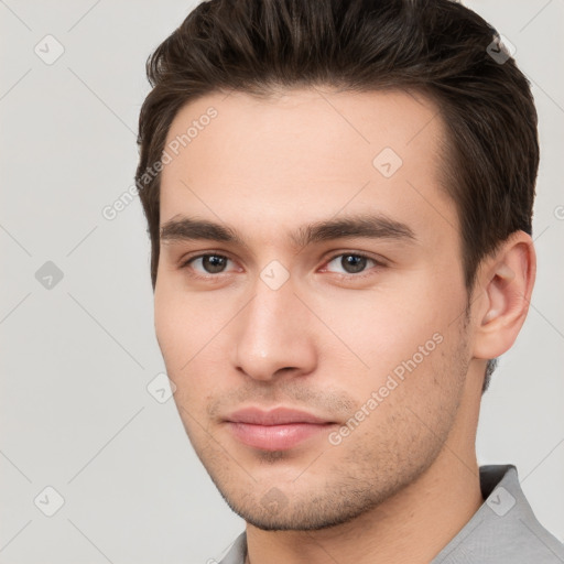 Neutral white young-adult male with short  brown hair and brown eyes