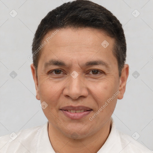 Joyful white adult male with short  brown hair and brown eyes
