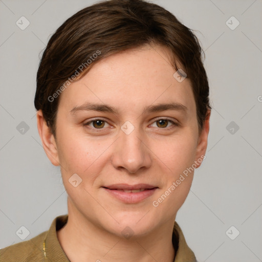 Joyful white young-adult female with short  brown hair and grey eyes