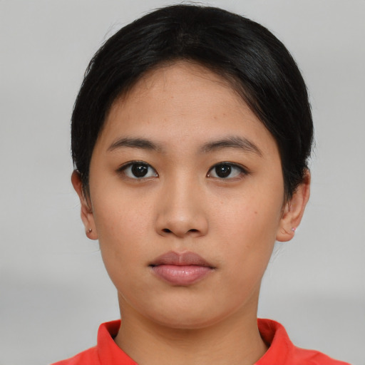 Neutral asian young-adult female with short  black hair and brown eyes