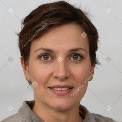 Joyful white adult female with short  brown hair and grey eyes