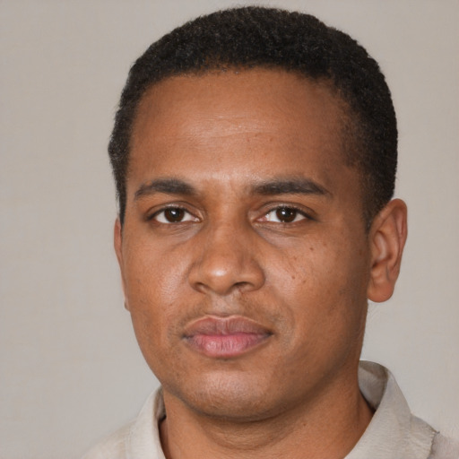 Neutral black young-adult male with short  black hair and brown eyes