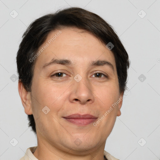 Joyful white adult female with short  brown hair and brown eyes